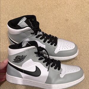 Air Jordan Men's Black, Gray, and White High-Top Sneakers